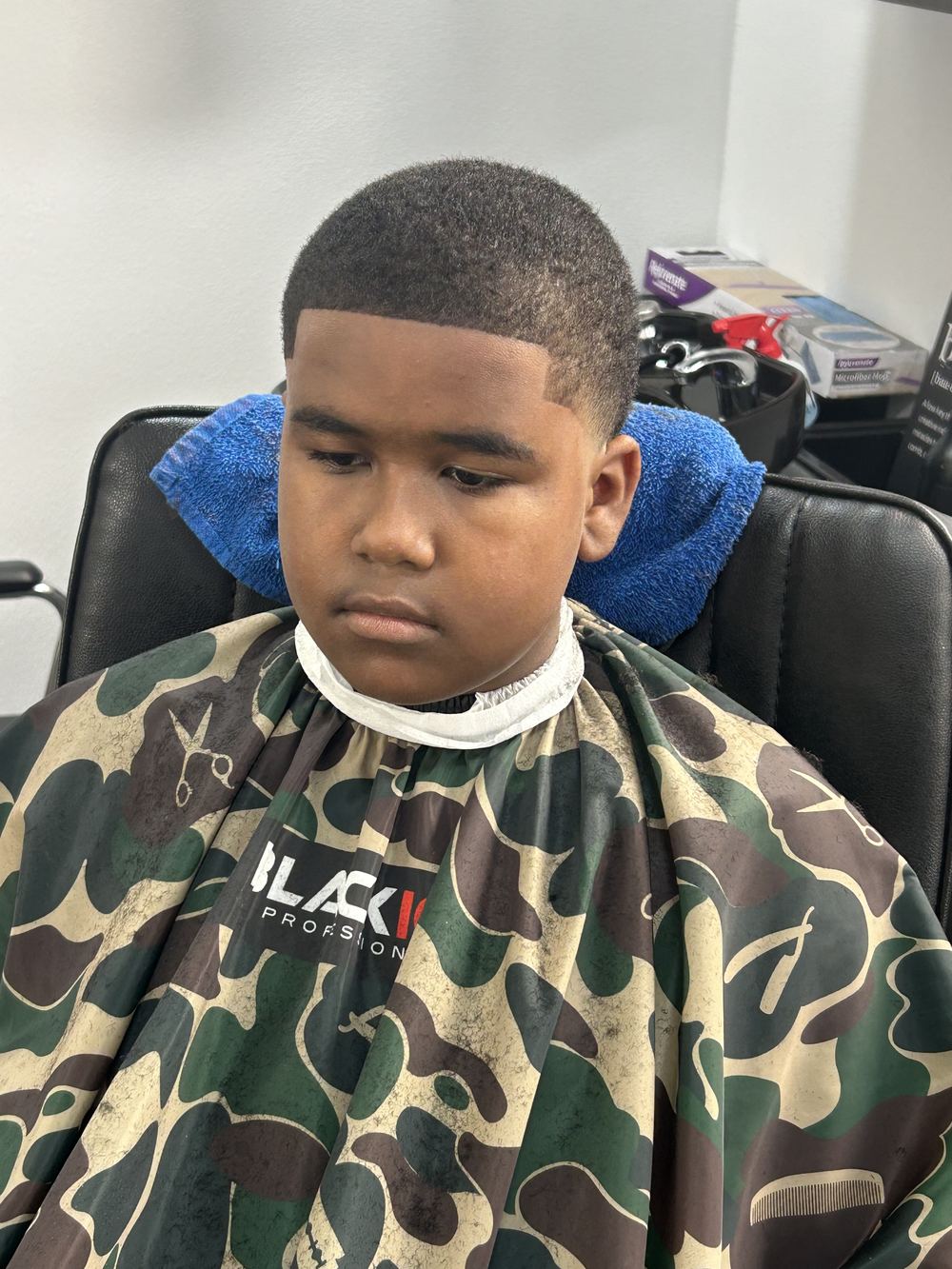 Fresh fade haircut by BlueDaBarber