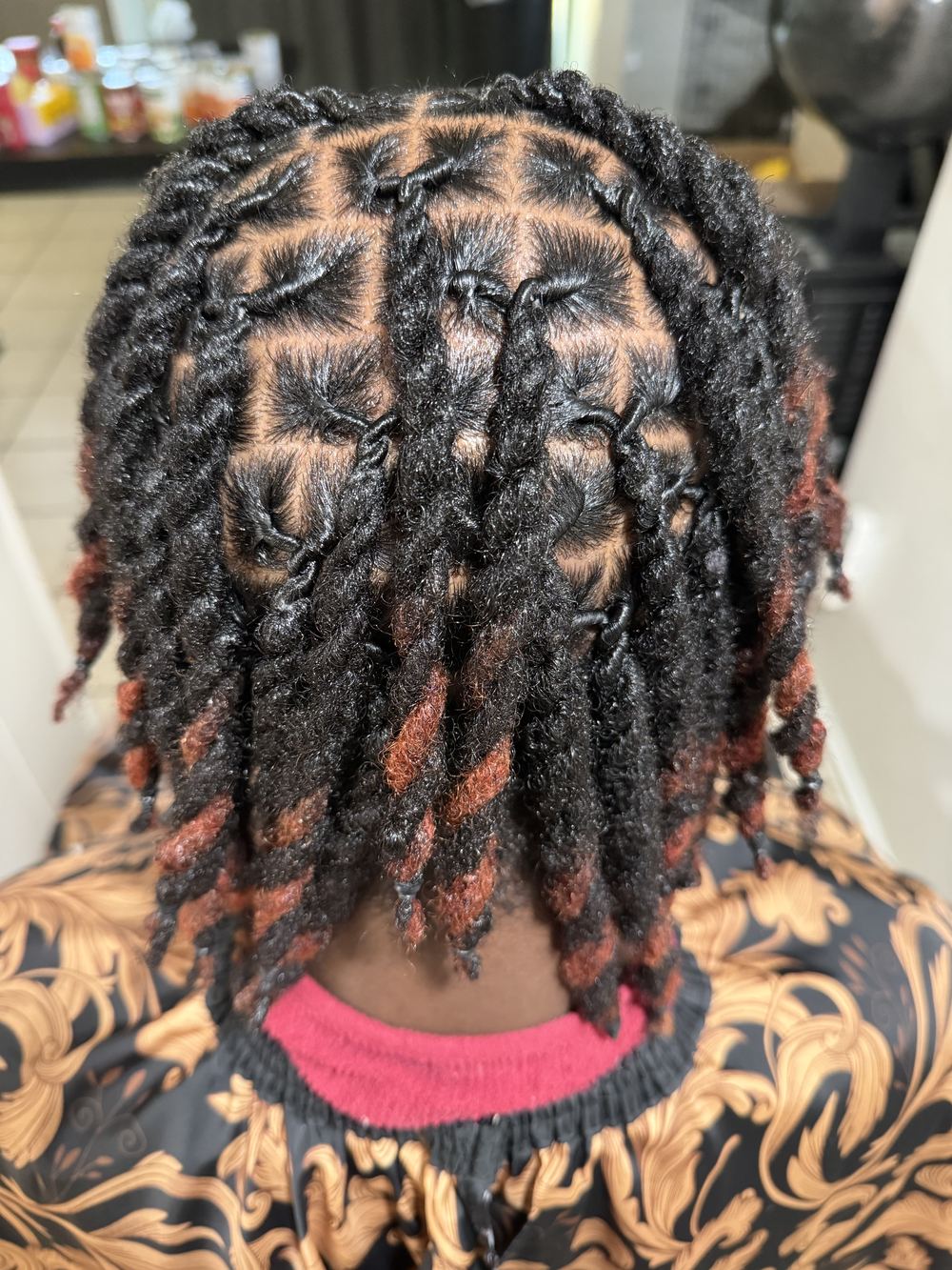 Loc retwist style by BlueDaBarber