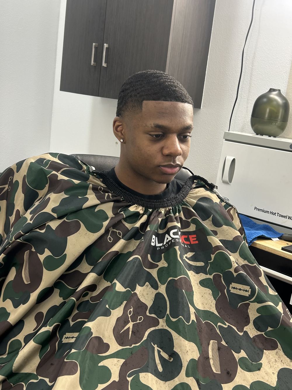 Teen haircut with skin fade by BlueDaBarber